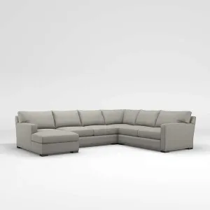 Isla- Sectional Sofa in two corners with a brown cabinet.